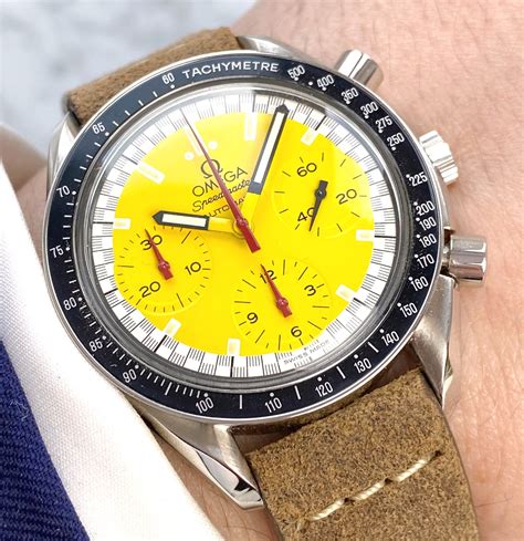 omega speedmaster michael schumacher yellow.